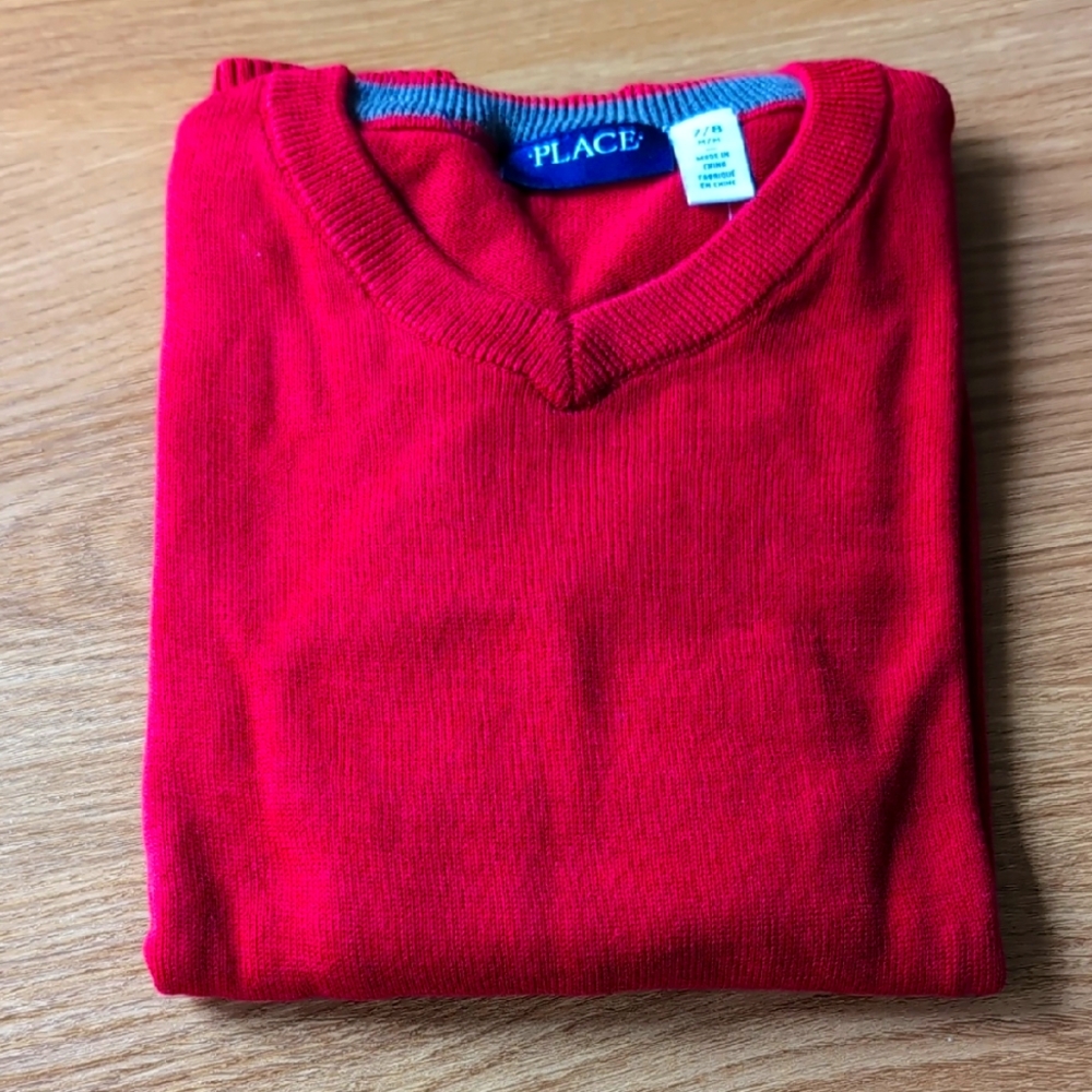 Place Red Sweater with V-neck Design and Soft Texture